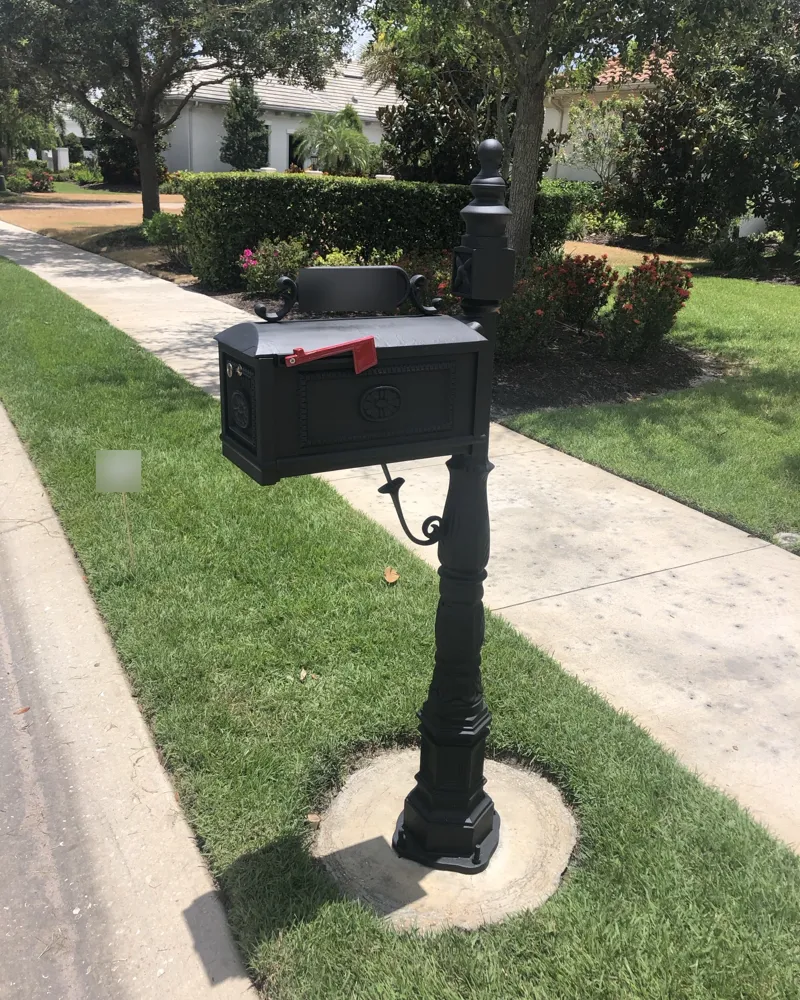After: the decorative mailbox and post refinished in a deep satin black