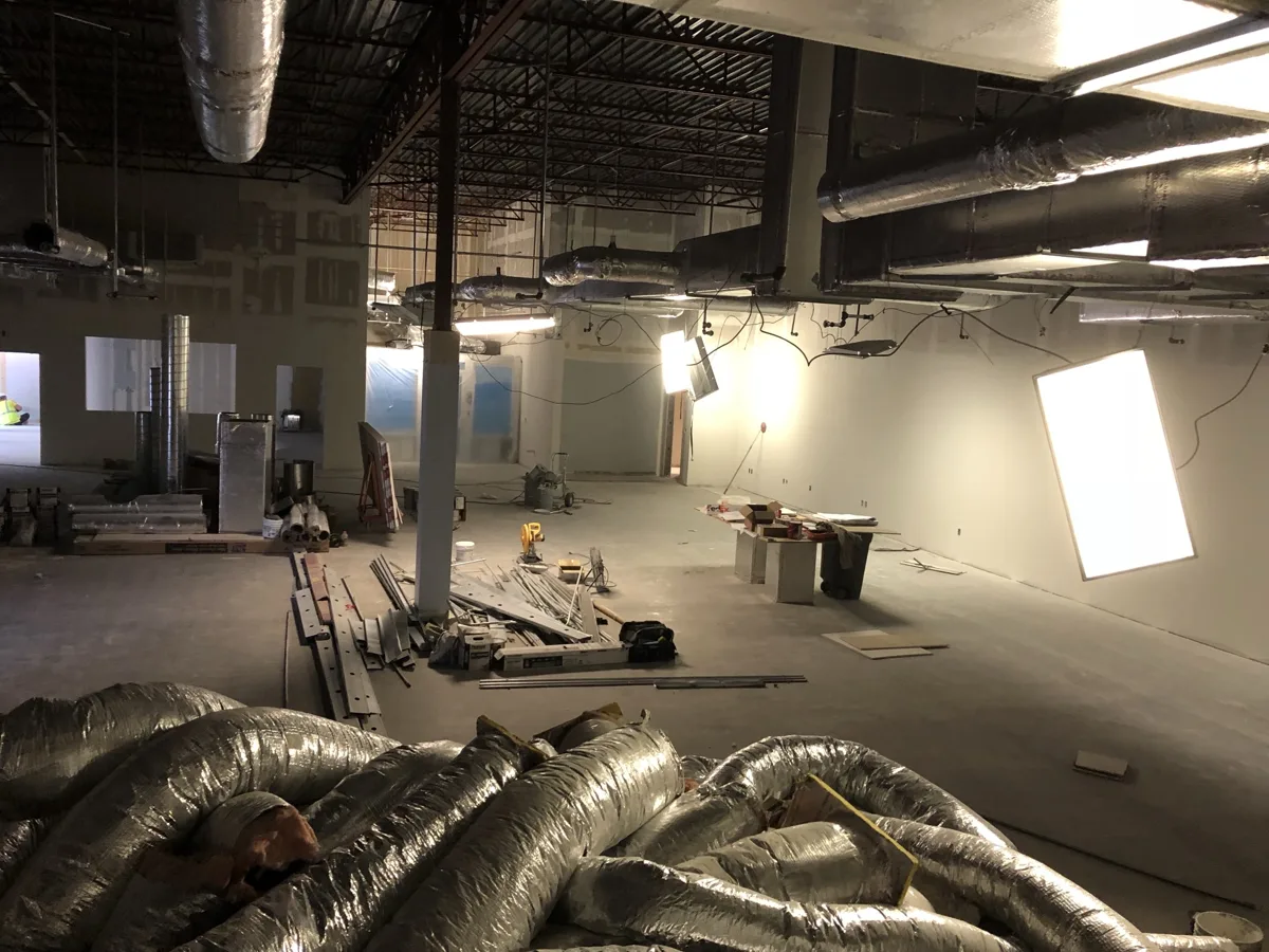 Drywall: new walls hung and finished around the open ceiling and ductwork