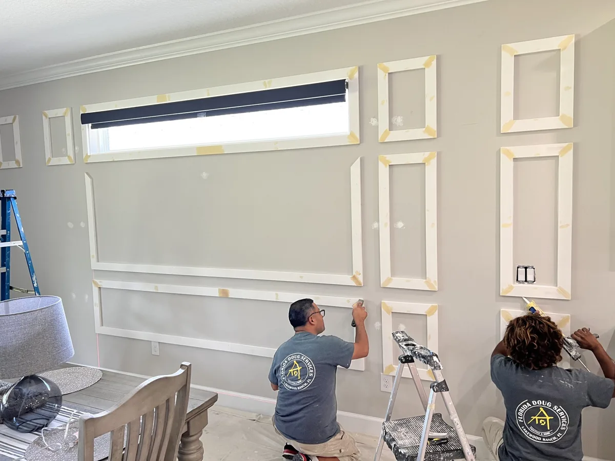 Process: Florida Doug Services crew installing picture-frame molding grid around a dining room transom window